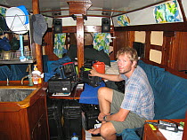 BBC Series South Pacific producer Mark Brownlow on board yacht 'Kuna', Solomon Islands, Melanesia, May 2008.