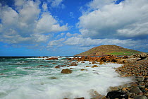 Waves breaking on rocky shore at Dunaff head, Lenan, Inishowen Peninsula, County Donegal, Republic of Ireland, August 2011