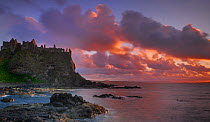 Dunluce Castle at sunset, North Antrim coast, County Antrim, Northern Ireland, UK, July 2011