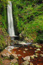 Glenevin waterfall with dark peaty water in pool, nr Crossconnel Clonmany, Inishowen, County Donegal, Republic of Ireland, August 2011