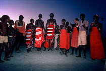 El Molo warriors and tribal people dancing during the Hippopotamus Ceremony, Lake Turkana, Kenya April 2008.