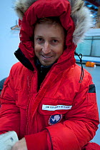Director, Chadden Hunter, preparing for Antarctic filming expedition at the National Science Foundation base, Christchurch, New Zealand, October 2009. Taken on location for BBC series, Frozen Planet,...