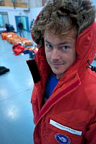 Director, Jeff Wilson, preparing for Antarctic filming expedition at the National Science Foundation base, Christchurch, New Zealand, October 2009. Taken on location for BBC series, Frozen Planet, Win...