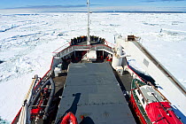 Royal Navy ship, HMS Endurance, makes its way through the sea ice of Antarctica, November 2008. Taken on location for the BBC series, Frozen Planet.