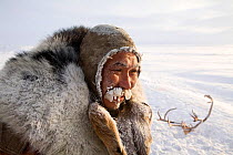 Chukchi reindeer herder iced up at -30 C during winter. Chukotskiy Peninsula, Chukotka, Siberia, Russia, 2010. 40 BELOW bookplate.