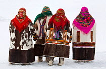 Khanty women in traditional dress at a Spring festival in the village of Pitlyar. Yamal, Western Siberia, Russia, 2006. 40 BELOW bookplate.