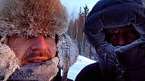 Cameraman Jeff Turner and Producer Chadden Hunter exposed at -40 degrees in Arctic circle in Northern Canada while filming wolves and bison hunting sequence. Taken on location for BBC Frozen Planet se...