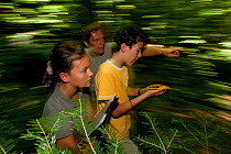 People learning about forest wildlife. Black Forest, Germany, July.