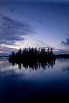 Sunset at Little Saganaga Lake in the Boundary Waters Canoe Area Wilderness, Minnesota, USA, May 2010