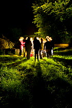 Groupn of people at a  moth trapping event, organised by Devon Moth Group, at Hazelwood Farm, near Okehampton, Devon, UK. July 2011.
