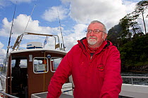 Peter Elford, skipper of Sea eagle tourist boat MV Brigadoon, Portree, Skye, Inner Hebrides, Scotland, UK, June 2011