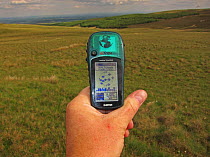 Garmin being used to follow transect during bird survey work, Kelburn North Ayrshire Scotland UK June 2010