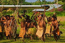 Papasena villagers welcome expedition members upon arrival by Cesna. June 2007.