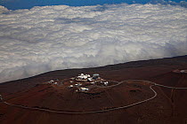 An aerial view of 'Science City' high altitiude observatory above the clouds in Haleakala National Park, Maui's dormant volcano, Hawaii, June 2011.