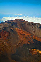 An aerial view across Sliding Sands Trail and Haleakala Crater to 'Science City' high altitude observatory at the summit in Haleakala National Park, Maui's dormant volcano, Hawaii, June 2011.