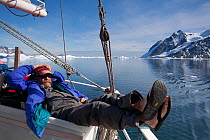 Dr Robert (Bob) Pitman, from US National Marine Fisheries Service, scientific advisor, relaxing on board the 'Golden Fleece' prior to searching for whales, Antarctic Peninsula, Antarctica, January 200...