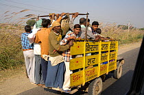 Typical rural transport, overloaded van with people, Maharashtra, India