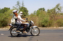 Indian family travelling by motorbike, Rajasthan, India