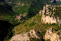 Eroded rocks of Gorge de la Jonte and Peyrelau medieval village. Tarn, Causse, Cevennes, France, September 2011.