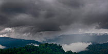 Severe thunder storm and clouds developing over lowland rainforest in the centre of Maliau Basin. Sabah's 'Lost World', Borneo.
