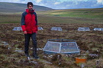 Scientist, Mike Whitfield, carrying out fieldwork on peatland carbon capture at Moorhouse NNR, Upper Teesdale, County Durham, UK, May 2011, Model released