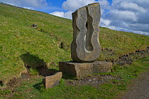 Carved stone artwork depicting the source of the River South Tyne, Alston Moor, Cumbria, UK, May 2011, Northern Pennines