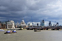 River Thames, St Paul's Cathedral and City of London buildings viewed from the South Bank, London, UK, September 2011