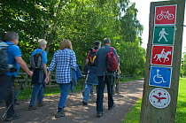 Hikers on the Red Kite trail in the Urban Red Kite area of the Derwent Valley, Gateshead, Tyne and Wear, UK, on the edge of Tyneside following on from the 'Northern Kites' re-introduction programme be...