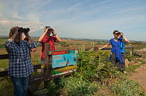 Birdwatchers on the Red Kite trail in the Urban Red Kite area of the Derwent Valley, Gateshead, Tyne and Wear, UK, on the edge of Tyneside following on from the 'Northern Kites' re-introduction progra...
