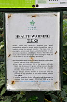 Notice warning of danger of Ticks, Richmond Park, Surrey, England, October
