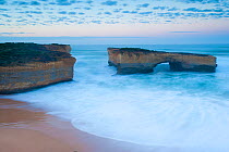 The London Bridge rock formation at sun rise, Great Ocean Road, Port Campbell National Park, Victoria State, Australia, September 2011.