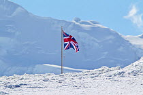 British flag (Union Jack) flying at Port Lockroy. Antarctic Peninsula, Antarctica, December.