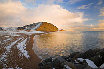 Snow covered beach and cliffs, West Bay, Dorset, UK, December 2010