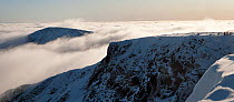 Panoramic view of Braeriach with temperature inversion clouds and the peak of Sgòr an Lochain Uaine (The Angel's Peak) beyond, Cairngorms NP, Scotland, UK, 2011