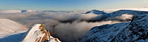 View from the summit of Braeriach and temperature inversion with the summits of Sgòr an Lochain Uainewith (far right), Cairn Toul (middle right) and Ben Macdui (left) beyond, Cairngorms NP, Scotland,