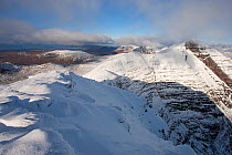 View from the summit of Tom na Gruagaich in winter, with shadow from peak, Beinn Alligin, Torridon, Scotland, UK, February 2010 Model Released