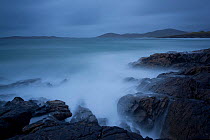 Long exposure of sea breaking on rocks, Horgabost, Isle of Harris, Outer Hebrides, Scotland, UK, October 2011