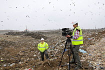 Cameraman Will Bolton filming landfill operations for 2020vision, Pitsea, Essex, England, UK, November 2011 Model Released