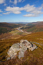 View looking north along the upper sections of the River Feshie, with rocks in the foreground, Glenfeshie, Cairngorms NP, Scotland, September 2011