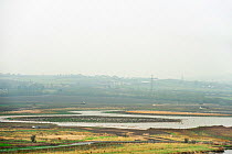 View of RSPB Bowers Marsh seen from  from  landfill site, Pitsea, Essex, England, UK, November 2011