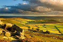 Scenic view of moorland from Stanage Edge, Peak District NP,  with fields in lower area, August 2011. Did you know? This National Park may be peaceful now, but during the Industrial Revolution it was...