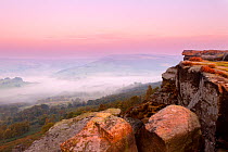 Scenic view from Curbar Edge at dawn, with mist in the distance, Peak District NP, UK, September 2011