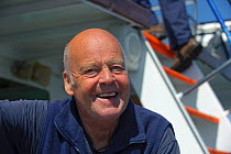 Portrait of Sea Life Surveys founder and proprietor Richard Fairbairns on board Sula Beag, a dedicated wildlife watching boat, Inner Hebrides, Scotland, UK, July 2011