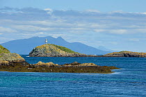 The Cairns of Coll with the Isle of Rum in the background, Inner Hebrides, Scotland, UK, July 2011