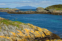 The Cairns of Coll with the Isle of Rum in background, Inner Hebrides, Scotland, UK, July 2011