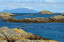 The Cairns of Coll with the isle of Rum in background, Inner Hebrides, Scotland, UK, July 2011