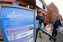Sign detailing tourist boat trips at Scottish Seabird Centre, North Berwick, Scotland, UK, August 2011