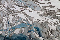 Reid Glacier with chunks of ice breaking off, Glacier Bay National Park, Alaska, USA, May 2011