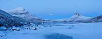 Panoramic of Sgurr Tuath and Stac Pollaidh at dawn, with frozen Loch Lurgainn in foreground, Coigach, Wester Ross, Scotland, UK, December 2010
