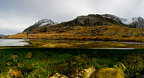 Split level image of a stream with Tryfan in the background, Snowdonia NP, Gwynedd, Wales, December